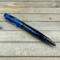 Black and blue resin cigar style ballpoint pen